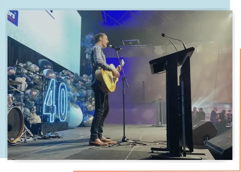 Jasper Hawkins performing at a corporate marquee event